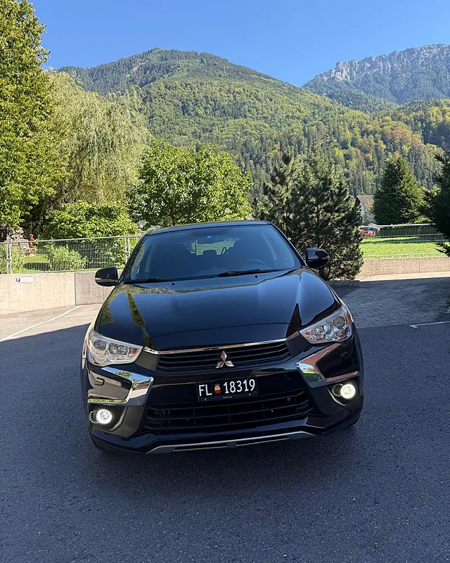 MY Ride Taxi von vorne, vor dem Alpenpanorama